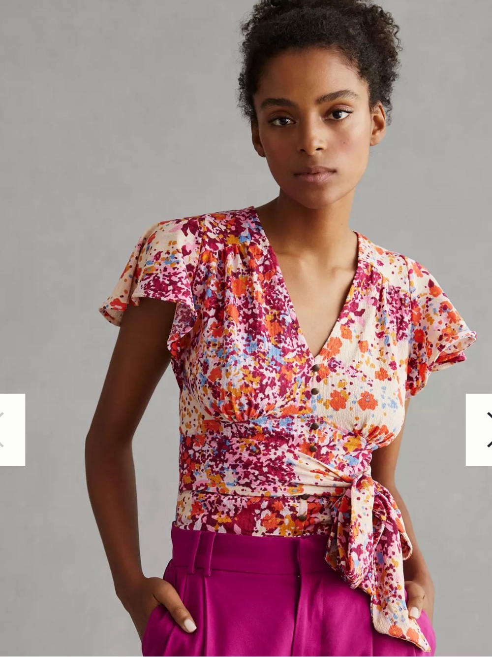 By Anthropologie V-Neck Flutter Hem Top.  This was a rental, I never wore it.